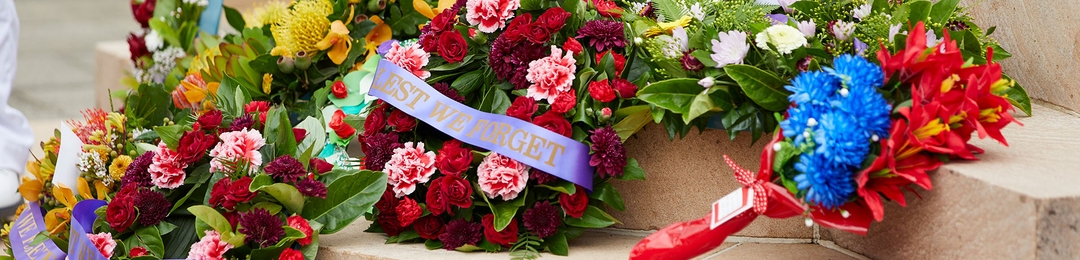 Wreaths laid out on steps